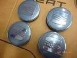 New Genuine Seat Ibiza, Exeo, Mii Set 4 Alloy Centre Caps Silver / Red 6LL601171. Price: $98.14.