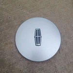Lincoln Continental Center Cap 1988-1997 Part # F0OC-1A096-BA Repainted Used. Price: $39.95.