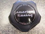 One (1) American Racing Atx Matte Black Center Cap SH1425006022 Used. Price: $35.00.