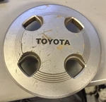 84 85 86 87 Toyota Corolla Oem Center Hub Cap Silver 69169 # 716643-0010 Used. Price: $20.00.