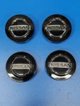 Nissan Black & Chrome Oem Center Caps 2-1/8" 54MM 40342-2M70B SET/4* Used. Price: $10.00.