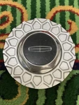 (1) Lincoln Town Car Oem Wheel Center Cap Silver Finish F0VC-1A096-AE Piece Used. Price: $23.00.