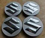Set Of Used Genuine Suzuki Cap Wheel Center 43252-83S00-0PG. Price: $80.00.