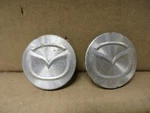 Mazda Wheel Center Cap 2 Pieces Oem # GD7F-37-19X Imperfect Used. Price: $19.88.
