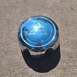 Mitsubishi Montero Center Cap, Chrome, 2000-2004 Part Number MB816581 02 Used. Price: $14.95.