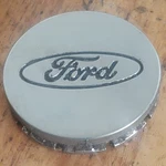 (1) 1998-2002 Ford Escort, Tracer F506-1A096-BA Factory Center Cap Oem Used. Price: $12.00.