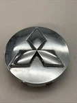 Mitsubishi Oem Eclipse Gallant Endeavor Raider Chrome Center Cap 52014332AA New. Price: $9.99.