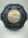 Mazda B2600I S232 37 191 Oem Wheel Center Rim Cap Hub Cover Black Bronze Used. Price: $30.79.