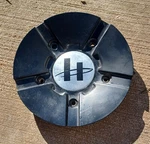 Helo Custom Wheel Center Cap, Gloss Black, Part Number HE846L153 01 Cracked Used. Price: $14.95.