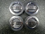 Nissan Gunmetal Blue & Chrome Oem Center Caps 2-1/8" 54MM 40342-2M70B SET/4* Used. Price: $35.00.