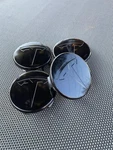 Set Of 4 Tesla Full Black 56 MM/2.20 Inch Wheel Rim Center Hub Caps Remanufactured. Price: $26.58.