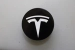 Oem Tesla Center Hub Cap Matte Black XWC1385-01 Used. Price: $20.00.