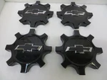 Chevy Silverado 2500 / 3500 24-26 Black Center Caps Set 84806053- Oem Used. Price: $140.00.
