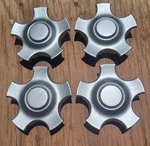 Ford Taurus Center Cap Set Of 4, 2000-2007 Part # YF12 1A096 Repainted Remanufactured. Price: $59.95.