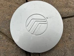 Mercury Tracer Oem Wheel Center Cap Silver 1997 1998 1999 F7K6-1A096-AB Used. Price: $12.95.