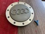 #y 1) Audi Wheel Center Cap Hub 4B0601165C Used. Price: $39.95.