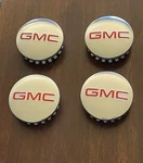 Set Of 4 Oem Center Caps Used. Price: $40.00.