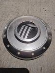 2002-2005 Mercury Mountaineer Factory Oem Wheel Center Cap 3L24-1A096-DA Used. Price: $16.90.