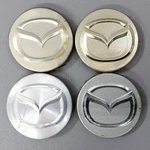 88-02 Mazda Protege Millenia 626 Factory Wheel Center Cap Set GD7F-37-19X Used. Price: $28.95.