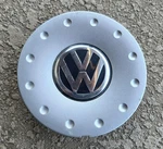Volkswagen Passat Oem Silver Center Cap W/ Black & Chrome Logo 1J0071212 666 Used. Price: $27.95.