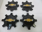 Chevy Silverado 2500 / 3500 24-26 Black Center Caps Set 84806053- Oem Used. Price: $150.00.