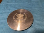 (1) Brushed Cadillac Center Cap 0354366 Used. Price: $25.00.
