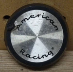(1) American Racing Black / Silver Custom Wheel Center Cap #89-8033 Used. Price: $9.95.