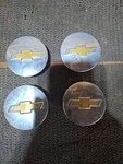 Chevrolet Equinox, Impala, Traverse, Uplander Oem Wheel Center Cap 9595010 Used. Price: $15.00.