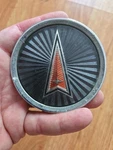 1983 1987 Pontiac Bonneville Parisienne Wheel Center Cap Emblem- E-801216-5 Used. Price: $14.00.