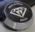 White Diamond Edition Center Hub Cap Black / Chrome CK022 1 Broken Tab Used. Price: $19.80.