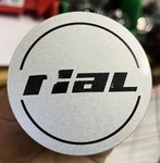 Rial Center Cap Wheel Hub Cover Silver With Black Writing N37 Used. Price: $24.95.