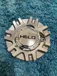 Used Helo 494 S1105-06-14 Chrome Wheel Center Cap Piece. Price: $30.00.