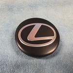1 Satin Black Lexus TX350 TX500H TX550H Center Cap 42603-0E060 OE060 Used. Price: $24.95.