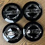 5/16" Nissan Armada, Titan Dark Charcoal Center Cap #40342-5ZM1A Set New. Price: $99.99.