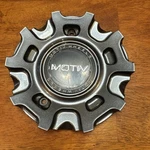 CAP-MH4-G21/ Motiv Gloss Grey Black Bolt In Center Used. Price: $30.00.