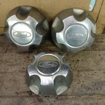 Ford Explorer Center Caps 3 Total- Part # F57A-1A096-AC/CC/MB/PB Oem 1995-1998 Used. Price: $58.95.