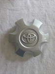 Toyota Tacoma Painted Silver Oem Center Cap P/n 4260B-AK010 Used. Price: $29.95.