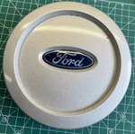 Ford Expedition Hub Wheel Center Cap Silver 4L14-1A096-CB 6L14-1A096. Used. Price: $14.99.