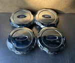 2004 2008 Ford F-150 18" 4-PACK Center Caps P/N4L34-1A096-DD #32 Used. Price: $79.99.