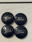 Set Of (4) Four Ford Fusion Focus Fiesta Escape Edge Oem Center 6M21-1003-AA Used. Price: $14.99.
