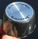 (1) American Racing 899037 Rim / Wheel Black Center Cap Used. Price: $24.99.