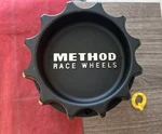 #q 1) Method Race Wheels Center Cap Black Used. Price: $39.95.
