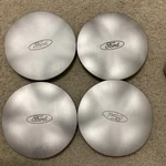 99 Ford Taurus Oem Center Hub Cap Silver 3179 F6DC1A096AA F6DC-1A096-AA 4PCS Used. Price: $50.00.