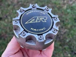 American Racing Custom Wheel Center Gray Finish AR898-2-CAP 3" Diameter Used. Price: $11.95.