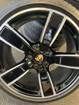 Gloss Black Porsche Center Caps With Colored Crest 911 718CAYENNE Taycan New. Price: $120.00.