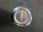 Mazda Truck Center Cap (B11193) # 64650 64651 Used. Price: $34.19.