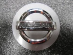 Nissan Bright Silver & Chrome Oem Center Cap 40342-2M70B 2-1/8" 54MM ONE/1* Used. Price: $10.00.