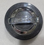 2012-2022 Nissan Armada, Titan Oem Dark Charcoal Center Cap 62595 40342-5ZM1A Used. Price: $37.75.