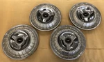 Set Of Original Fomoco 1963 Ford Thunderbird Spinner Flipper Style 14" Hubcaps Used. Price: $374.99.