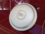 1991-1997 Ford Escort Center Cap (1) Factory Silver Oem # F7C6-1A096-BB Vintage Used. Price: $27.99.
